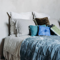 Goa Pompon Cushion in Lombok, from Le Monde Sauvage by Beatrice Laval