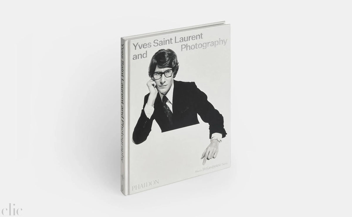 Book titled 'Yves Saint Laurent and Photography' on a white background