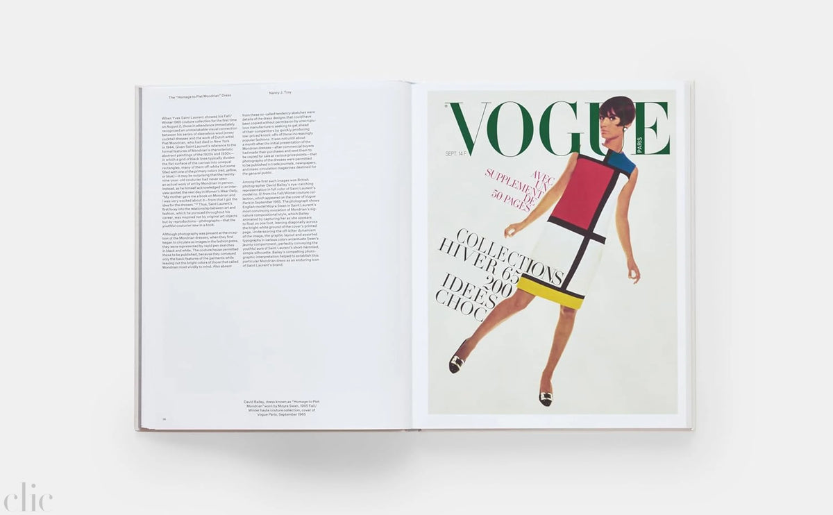 Open magazine displaying an illustration of a woman in a colorful outfit with 'Vogue' branding.