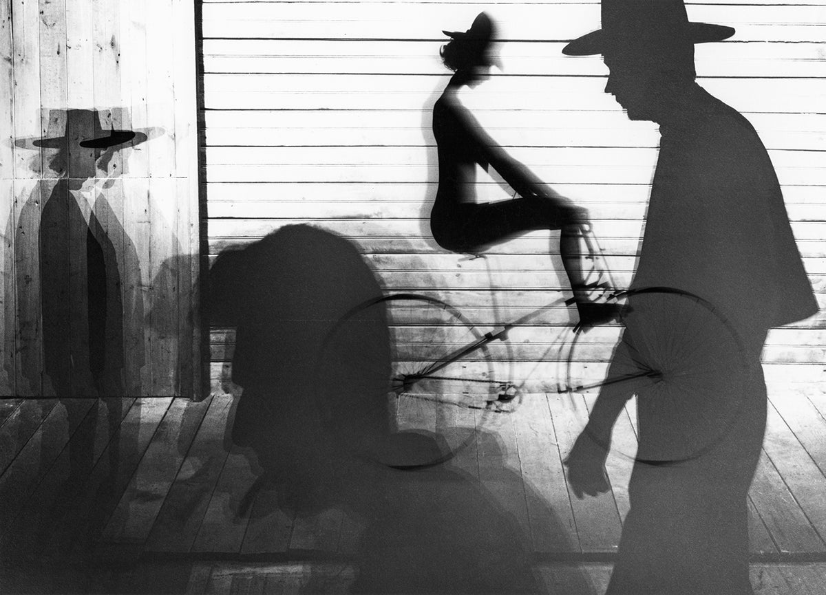 Kate Cycling Cycling Down The Boardwalk - Hyper Rare by Sam Haskins