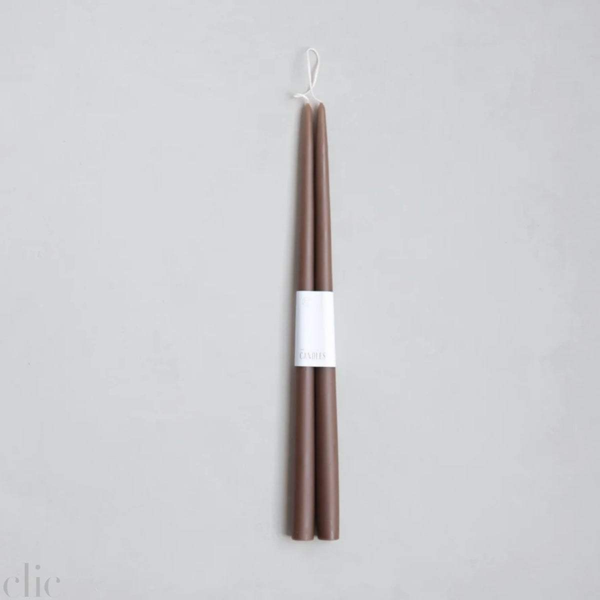 Dipped Taper Candle in Peat, from The Floral Society