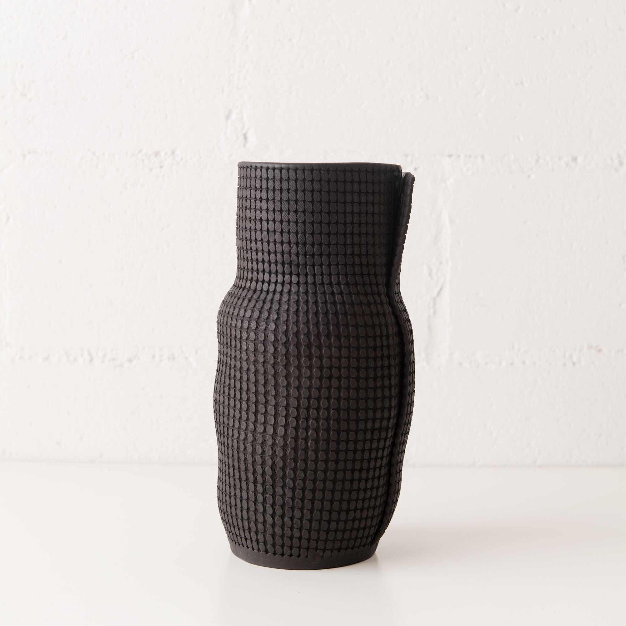 Grid Bottle Vessels in Black, from CYM Ceramics