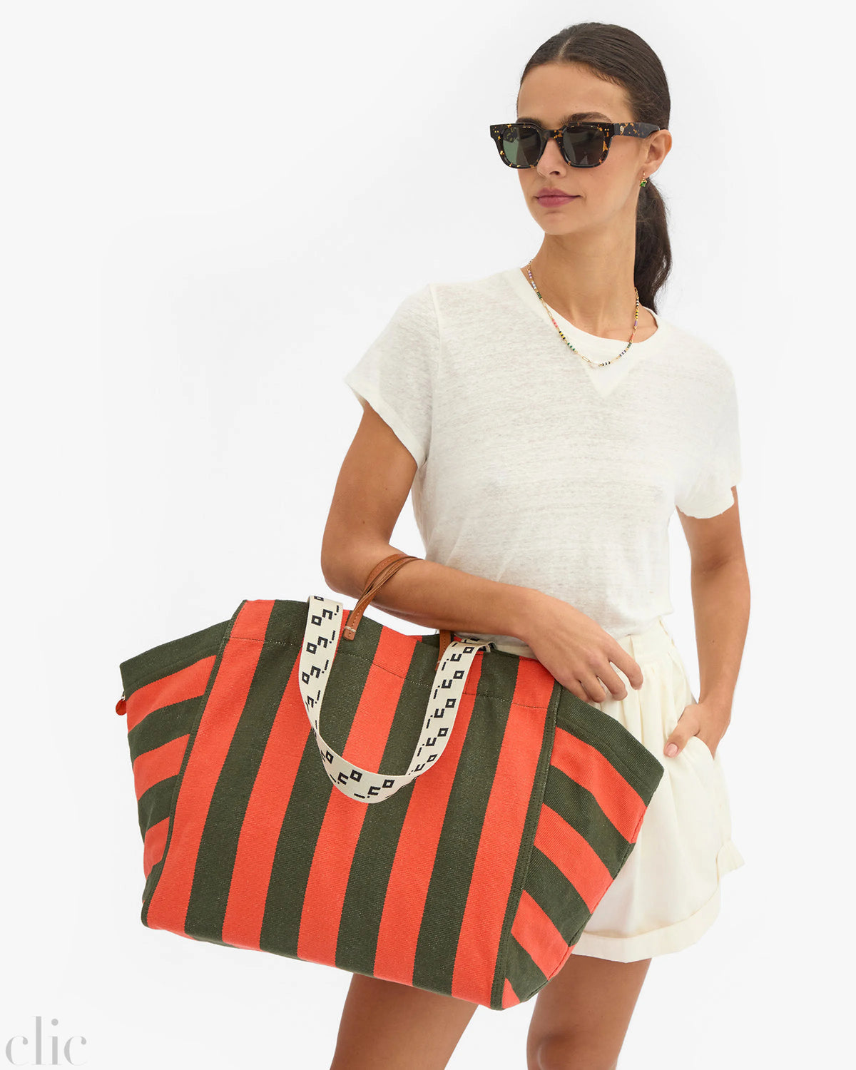 La Côte Tote in Army and Bright Poppy Canvas Stripe, from Clare V