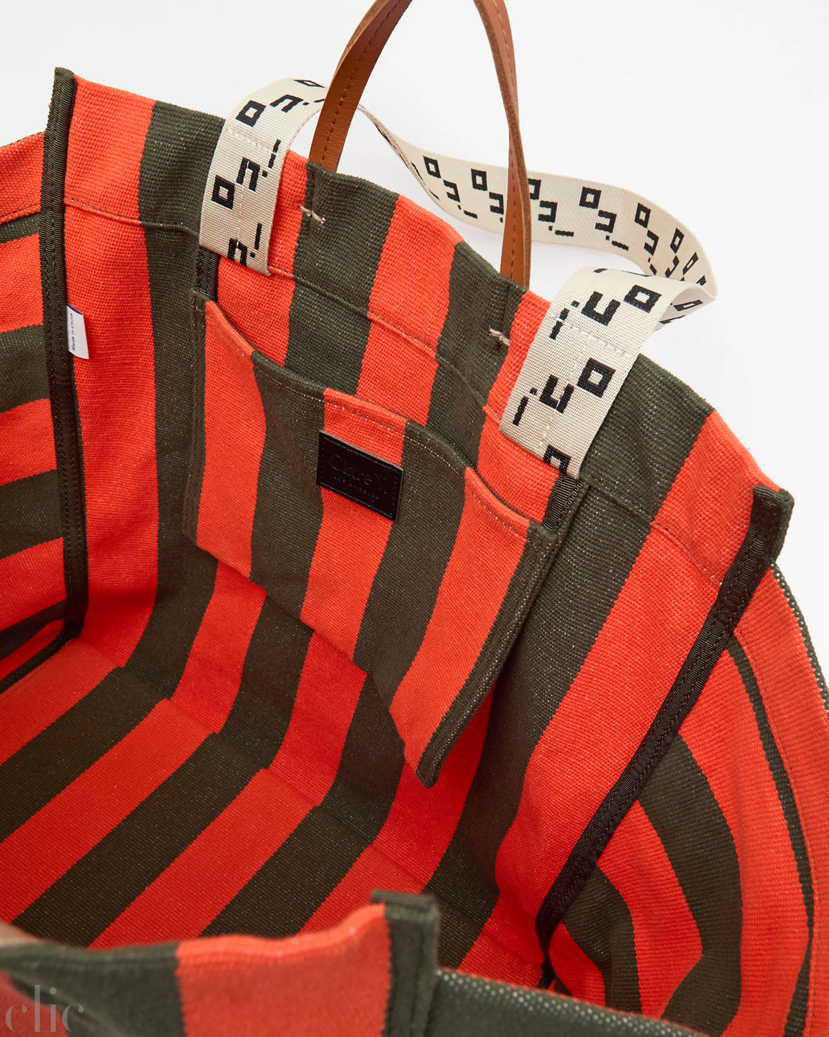 La Côte Tote in Army and Bright Poppy Canvas Stripe, from Clare V