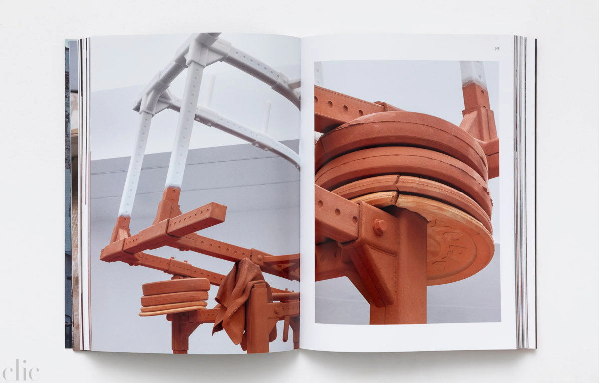 Open book showing close-up images of architectural elements.