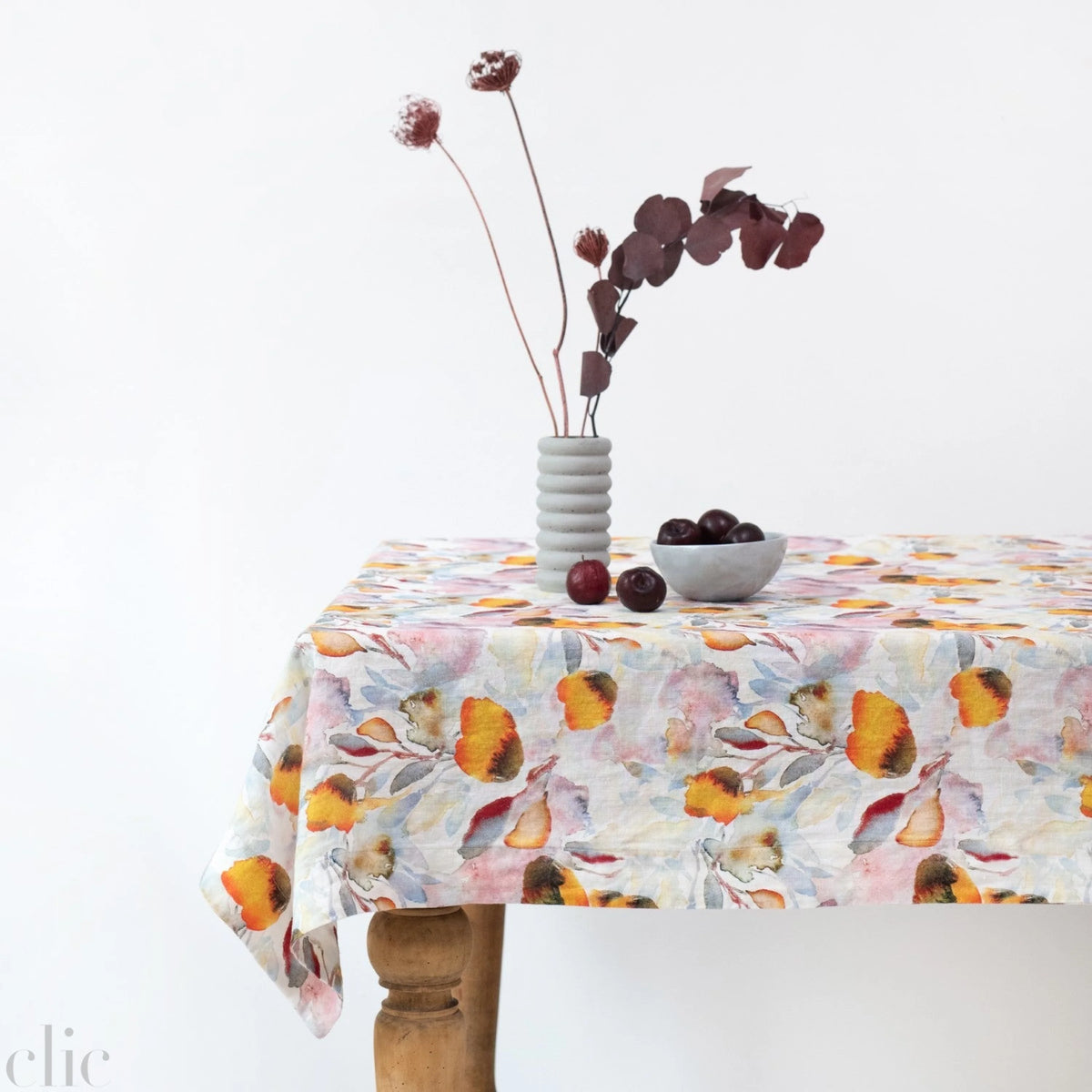 Orange Flow Tablecloth on White Linen, from Linen Tales