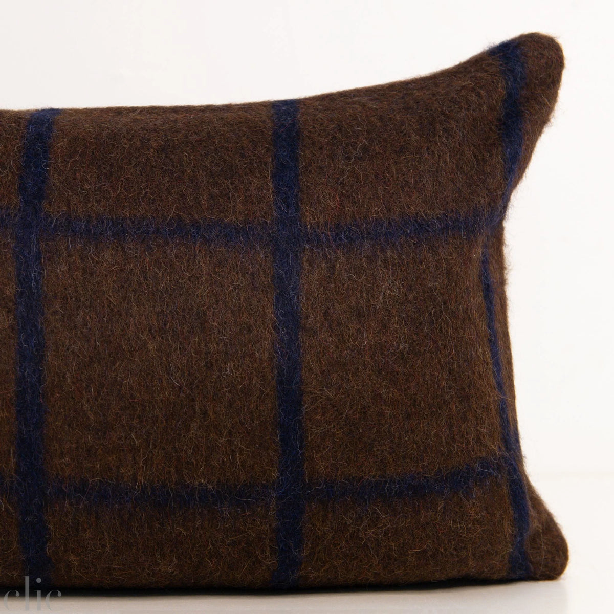 Umi Heirloom Throw Pillow in Dirt and Midnight