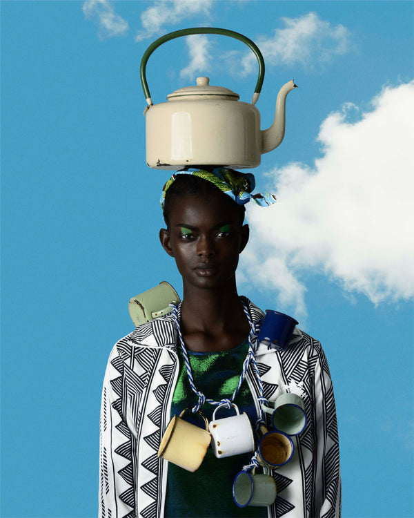 Woman With Teapot by Kevin Mackintosh