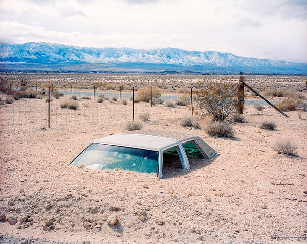 Buried Car in Lucerne Valley, California by Rob Hann
