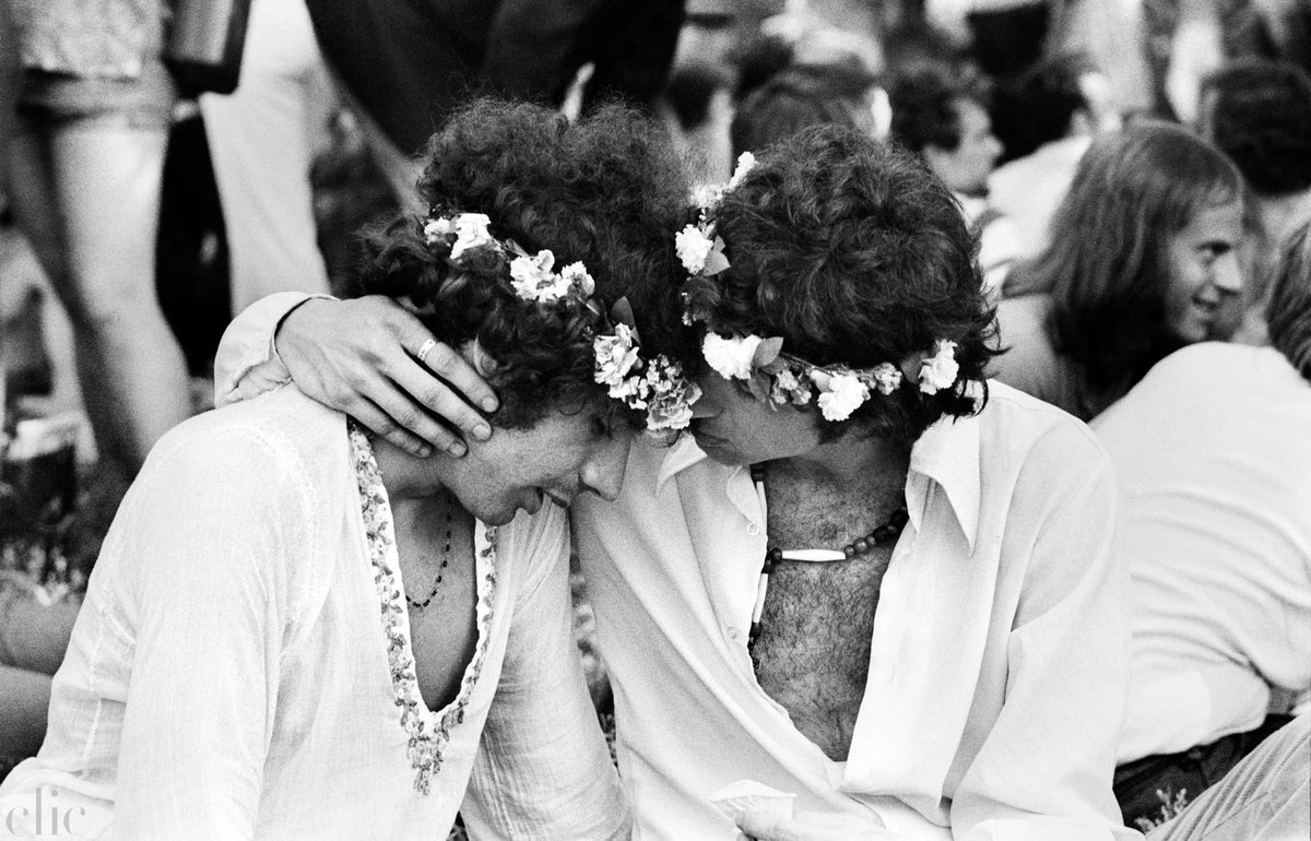 "Two Men With Flower Crowns" by Jean Pierre Laffont