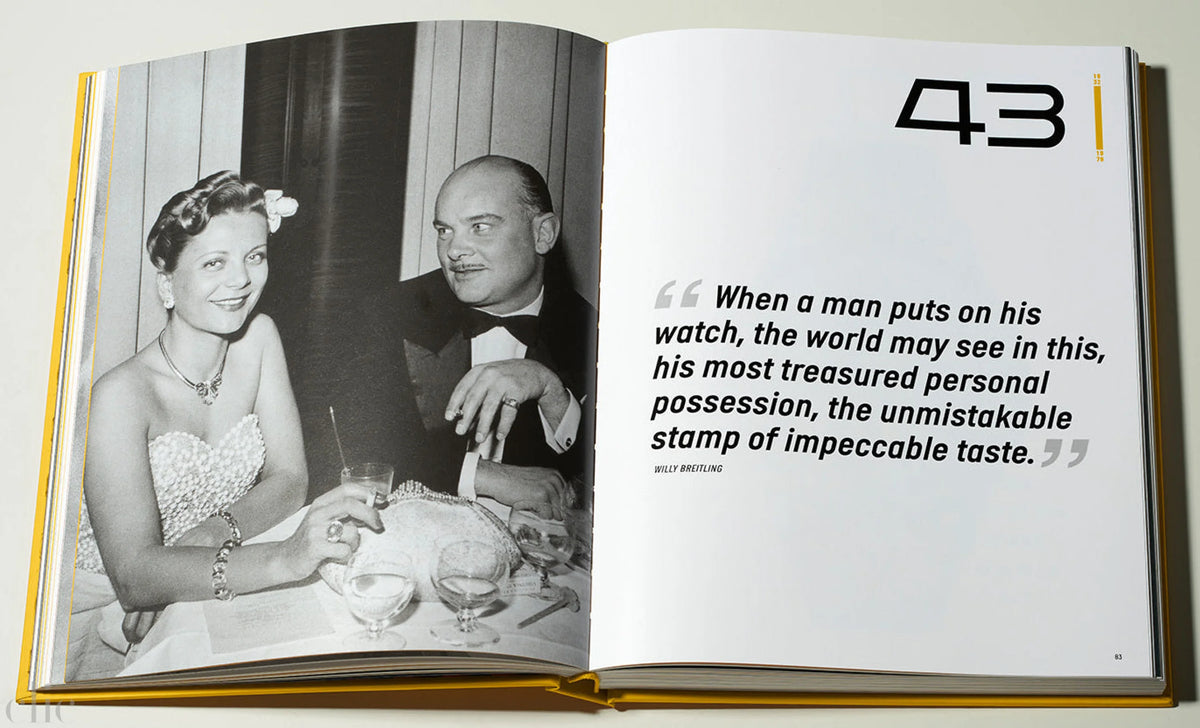 Open book with black and white photograph of a couple and text on a light gray background