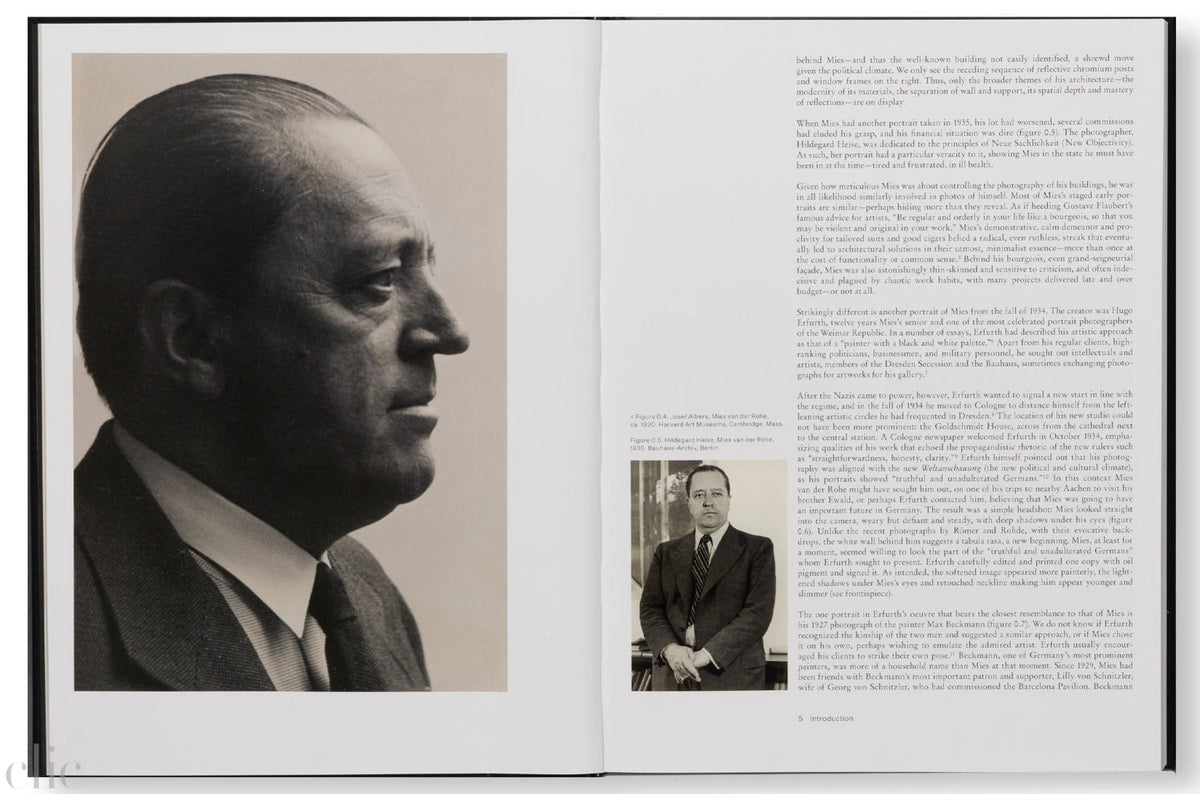 Book open to a page with a black and white portrait on the left and text on the right.
