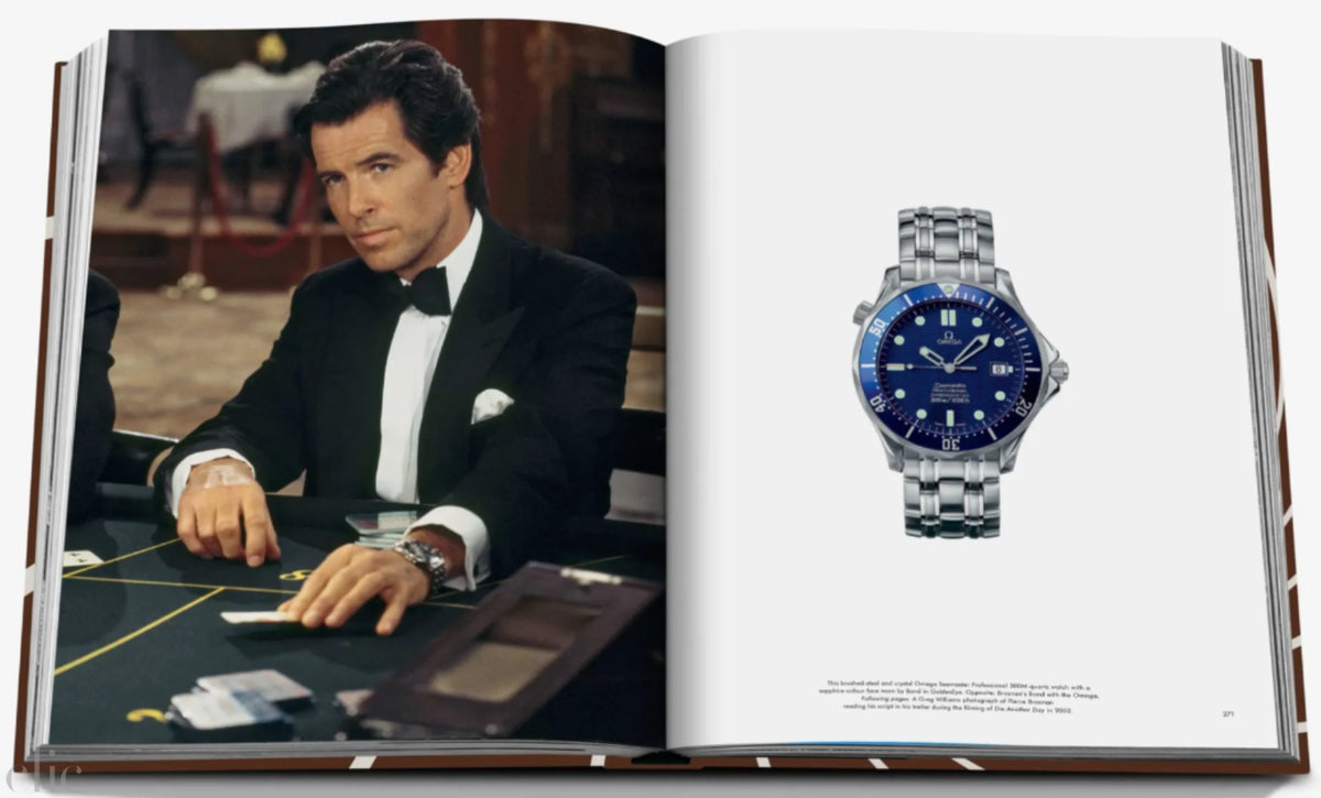 Open book showing a scene from a movie with a man in a tuxedo and a close-up of a watch.