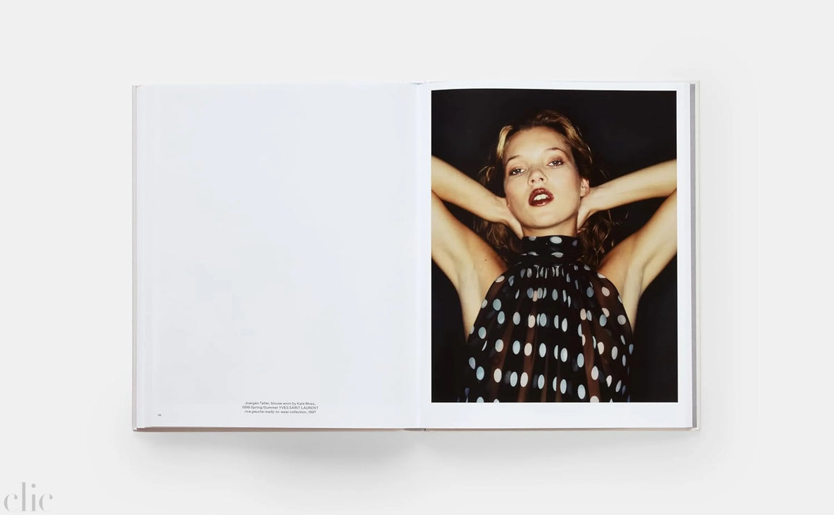 Book open to a page with a photograph of Kate Moss in a polka dot dress.