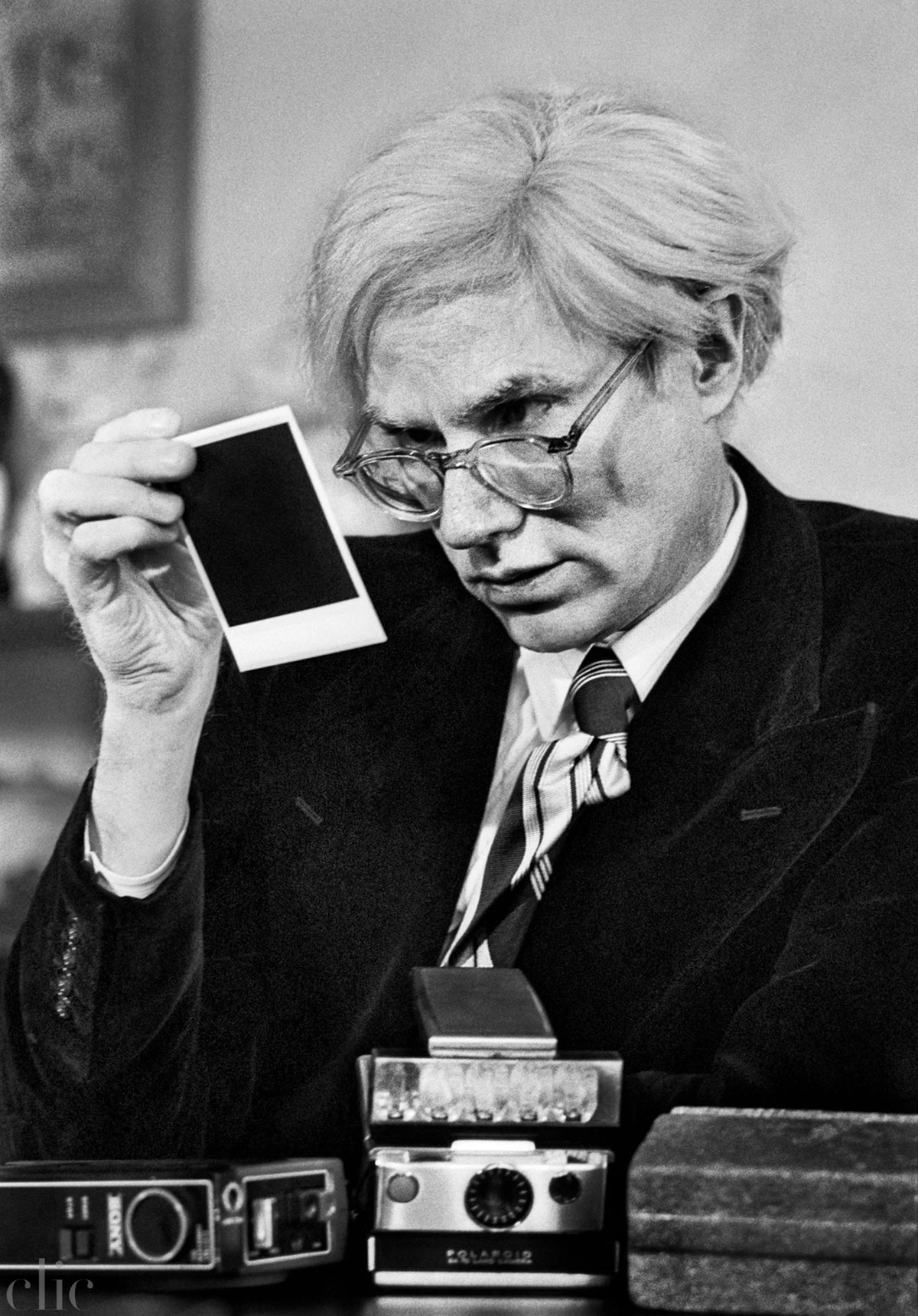 Andy Warhol & Polaroid III by Jean Pierre Laffont