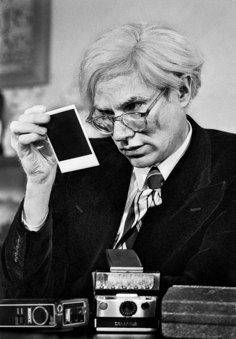 Andy Warhol & Polaroid III by Jean Pierre Laffont