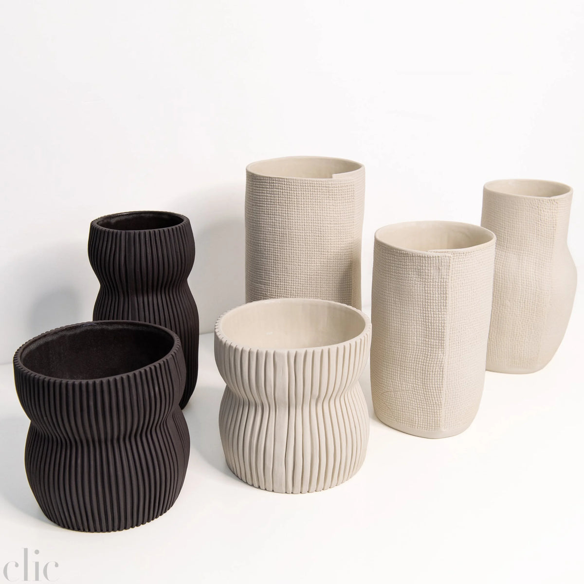 05 Round Curvy Vase in Black, from CYM