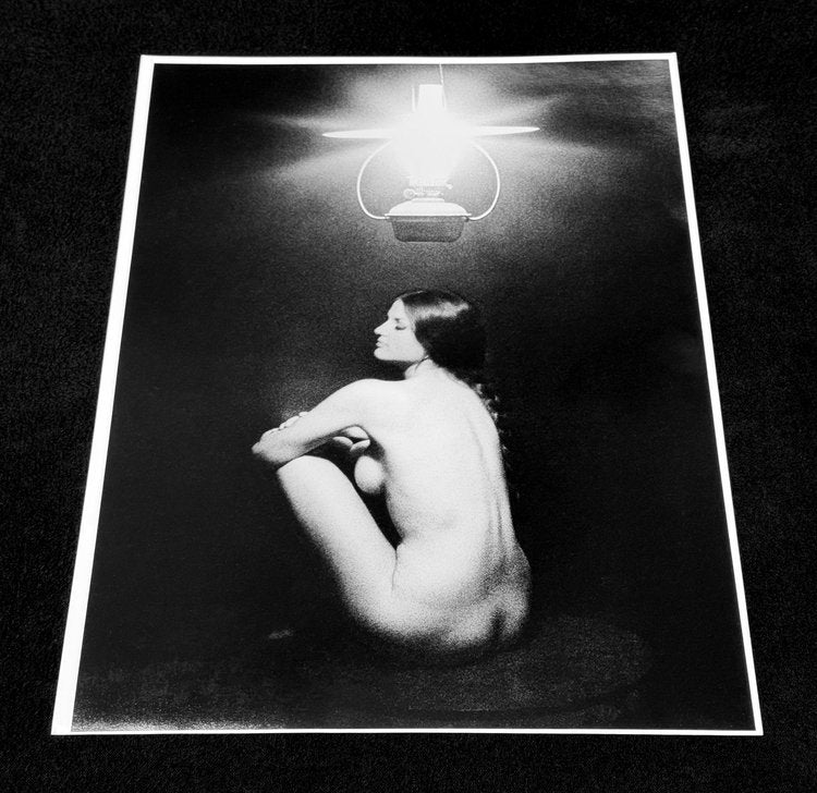 Bes Seated Under Lamp - *Signed* Later by Sam Haskins