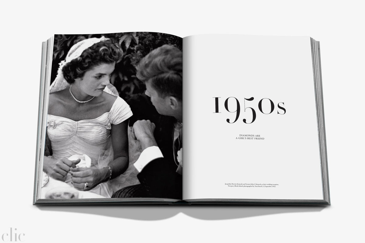Open book showing a black and white photo of a couple from the 1950s.