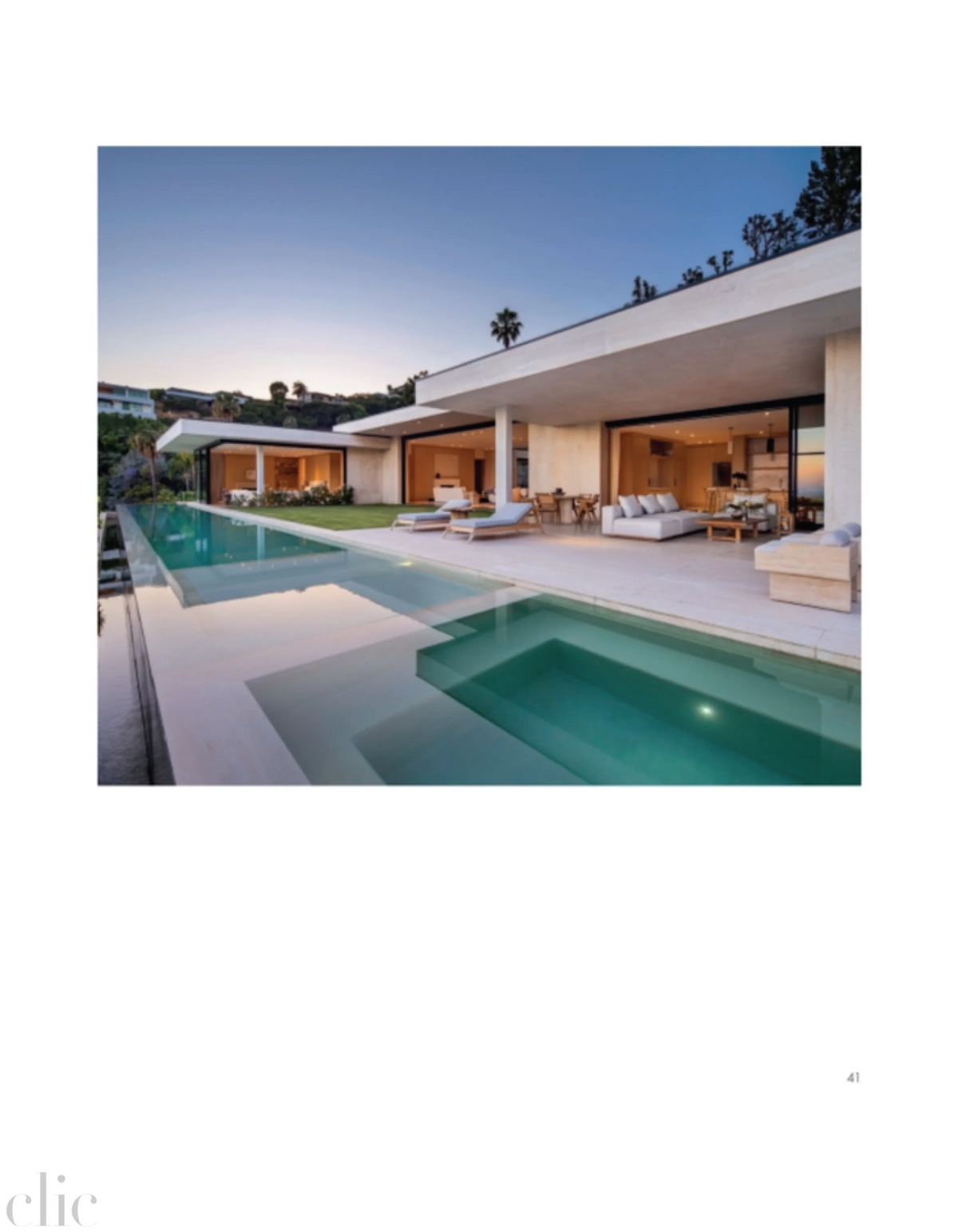 Modern house with a pool at dusk