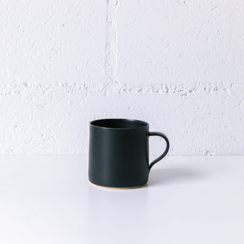 T112 Mug in Black, from Tracie Hervy