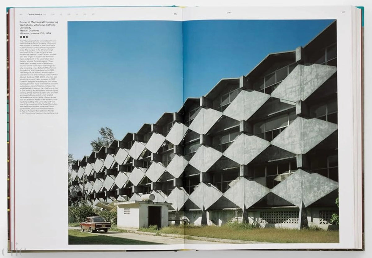 Open book showing a photograph of a geometric-patterned building against a blue sky.