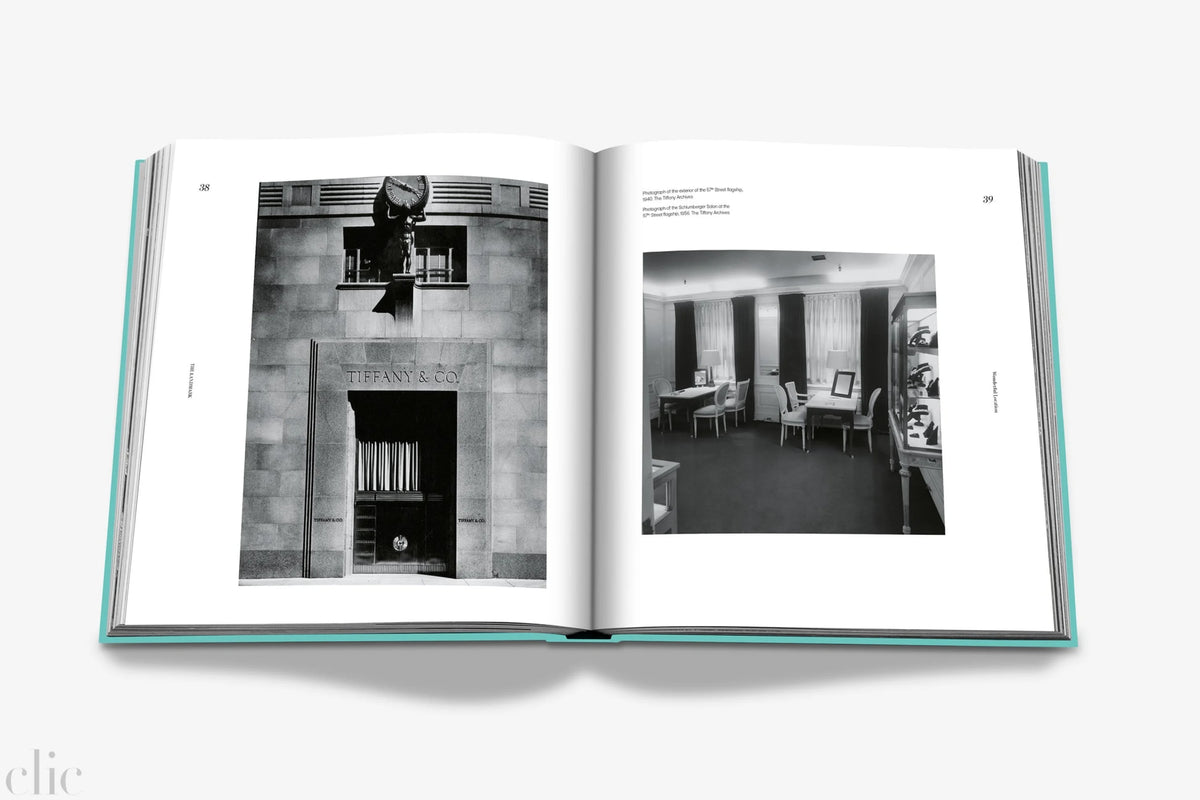 Open book showing black and white photographs of architectural and interior design elements.