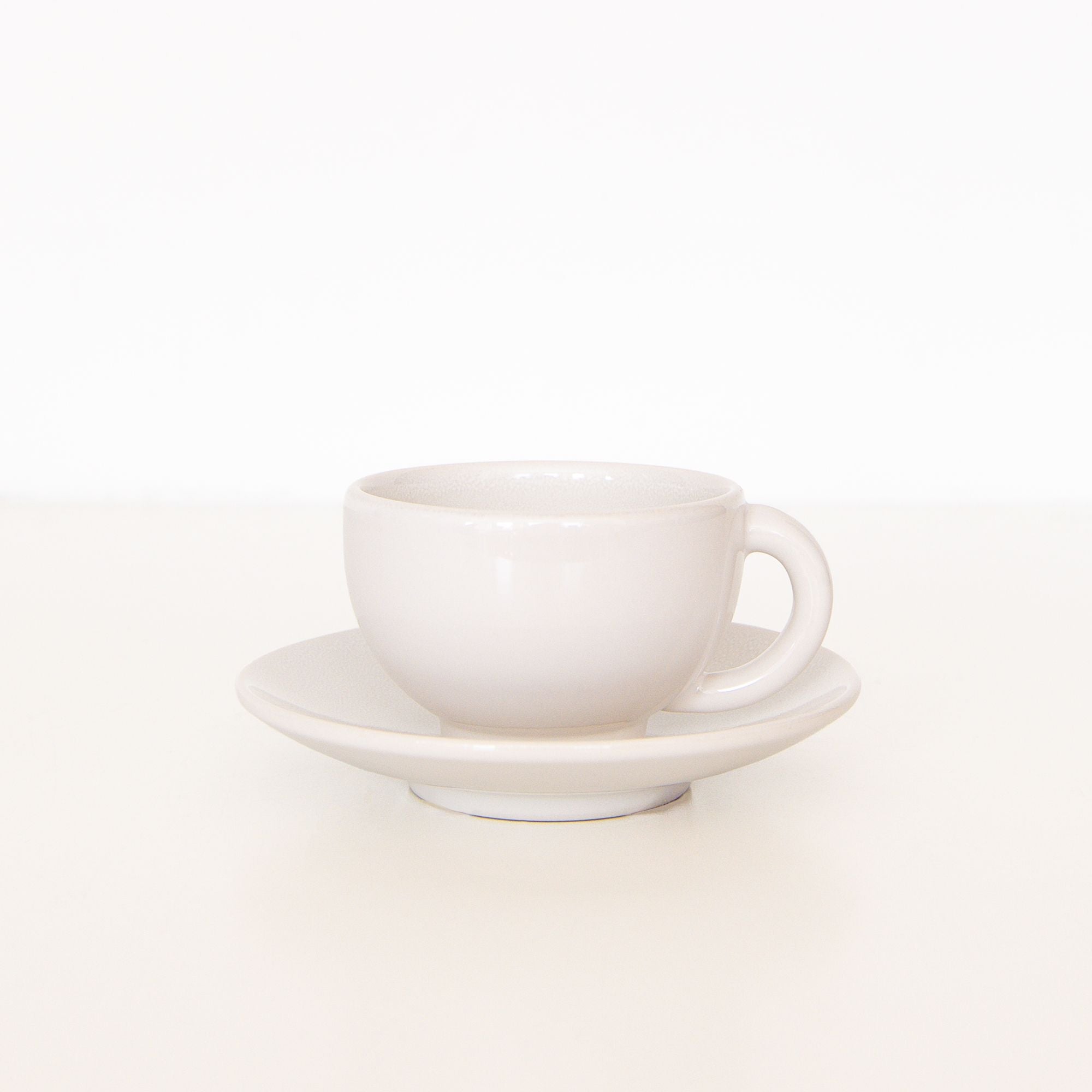 Tourron Cup and Saucer in Neige, from Jars