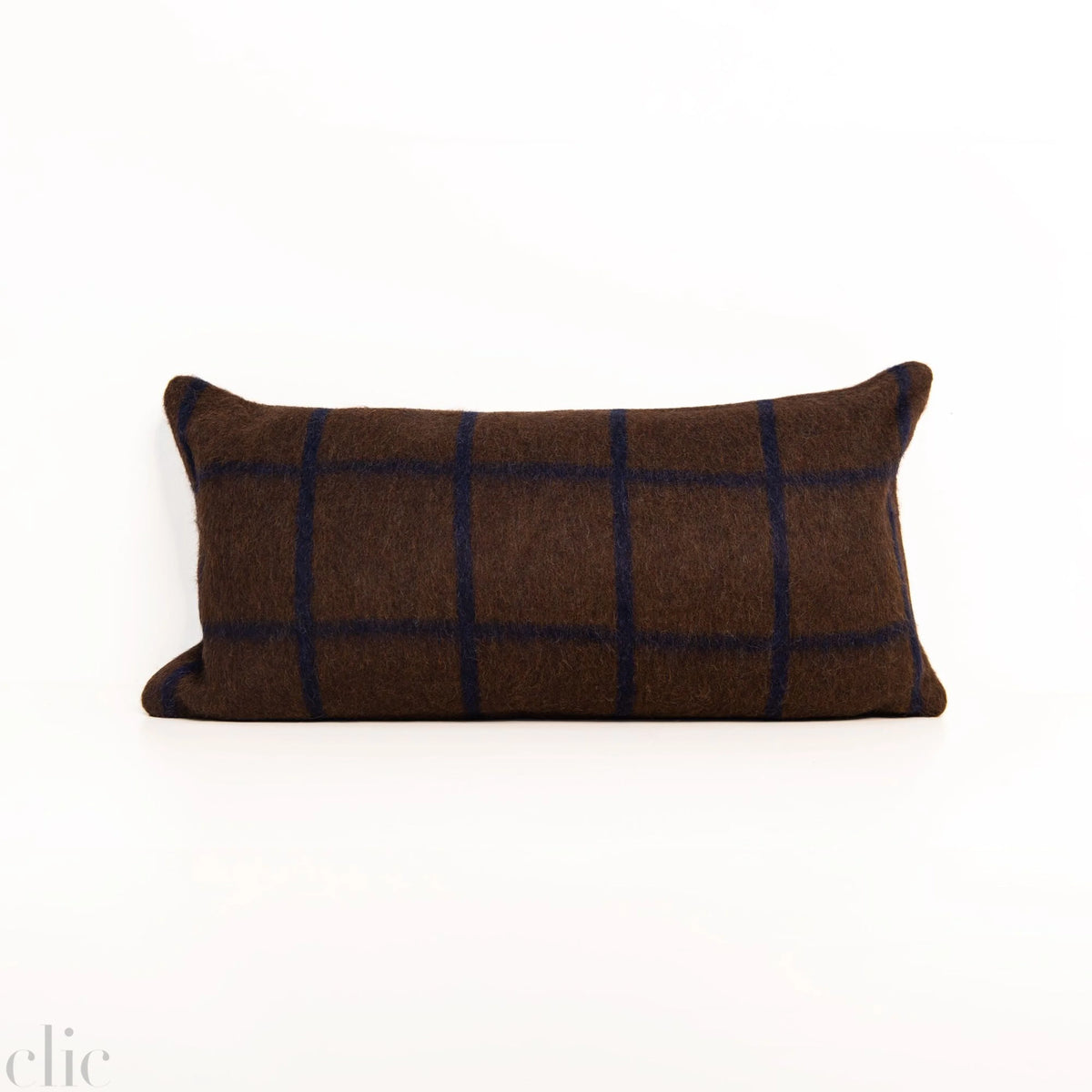 Umi Heirloom Throw Pillow in Dirt and Midnight