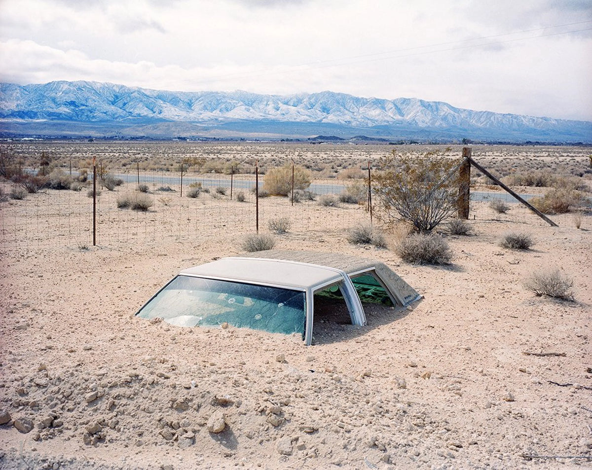 Buried Car in Lucerne Valley, California by Rob Hann