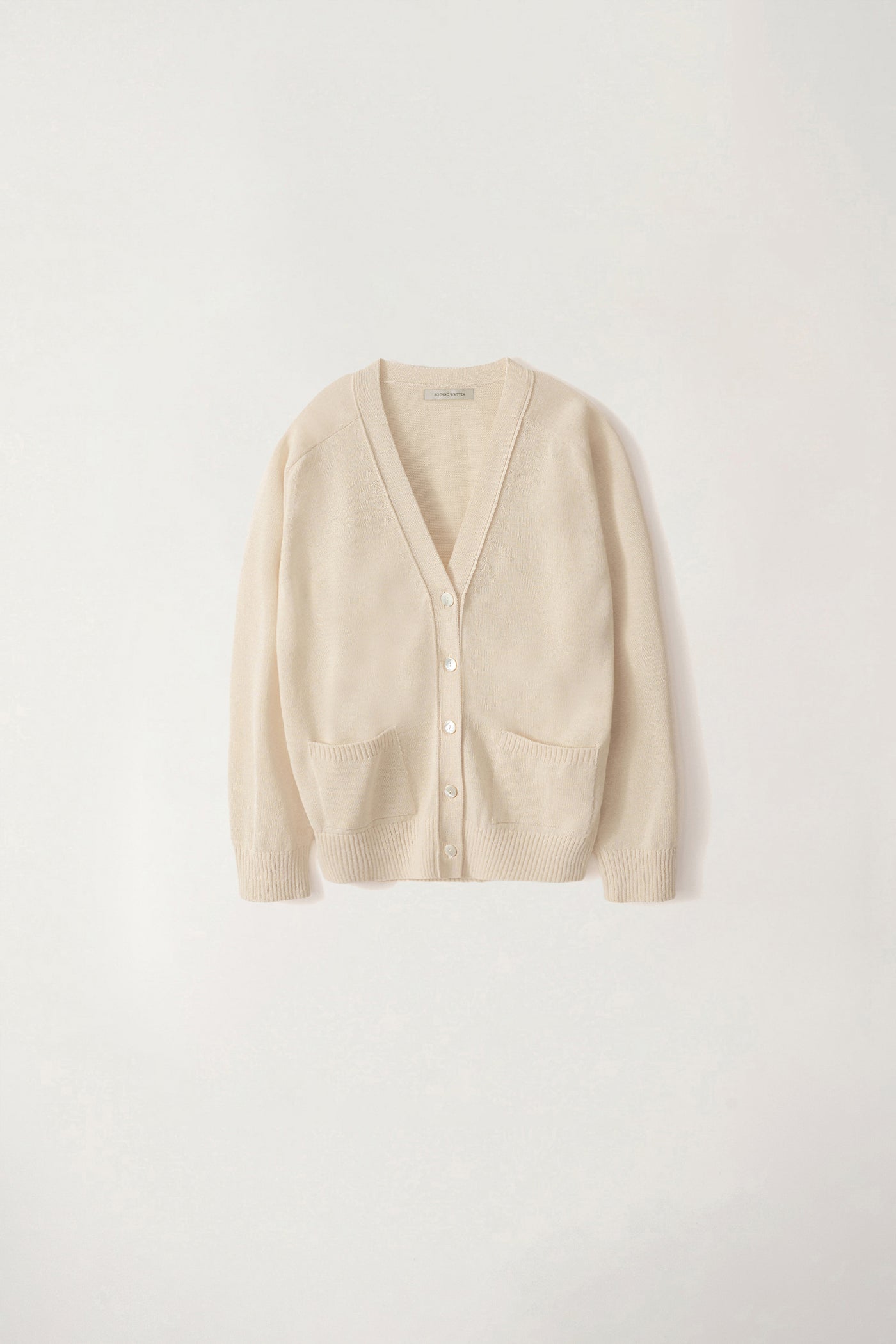 [NOTHING WRITTEN] Classic paper cardigan (Ivory) ☆送料込☆ Classic Paper Cardigan in Ivory, from Nothing Written – Clic