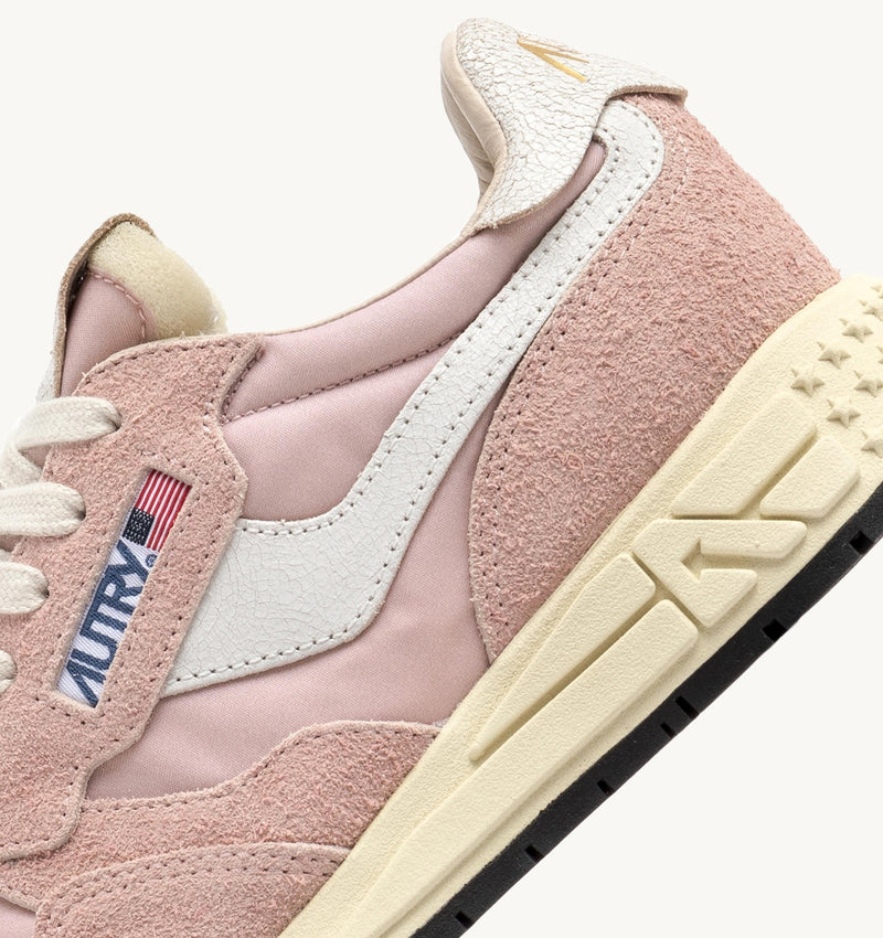 Reelwind Low Sneaker in White and Powder Pink, from Autry