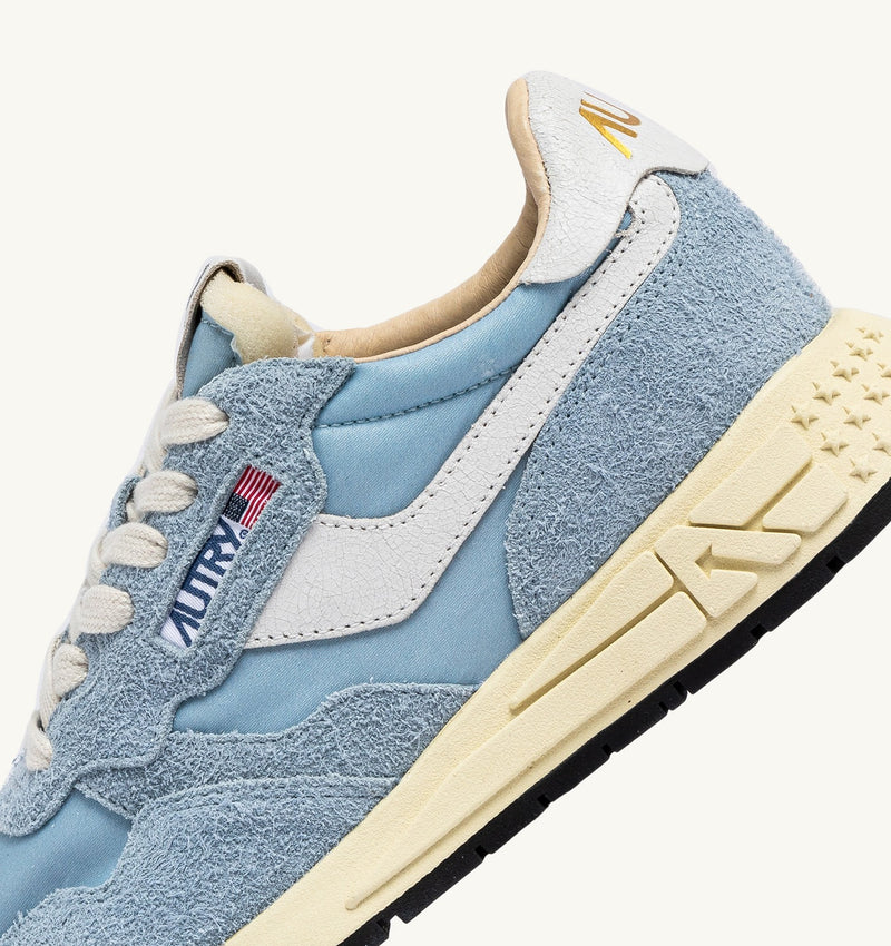 Reelwind Low Sneaker in White and Celestial Blue, from Autry