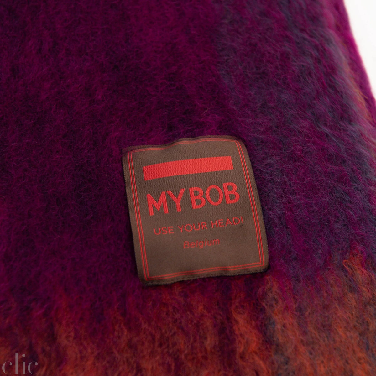 Mantac Mobe Throw in Purple and Orange