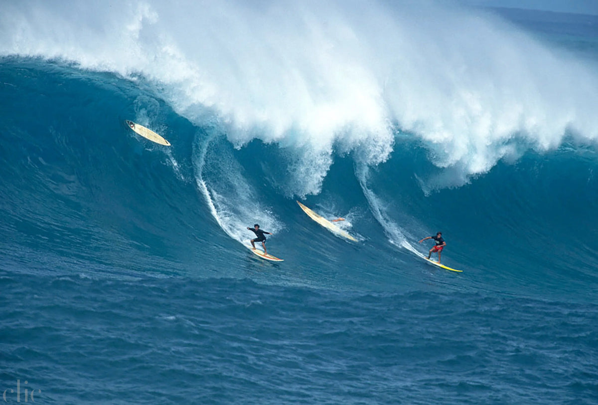 Waimea Bay, Oahu, James Jones and Brock Little by Jeff Divine