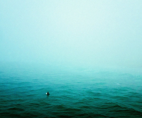 Surfer in Fog by Josh Soskin