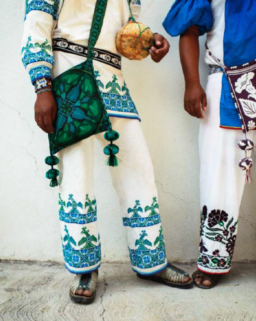 2 Huichol Men Waiting by Anne Menke