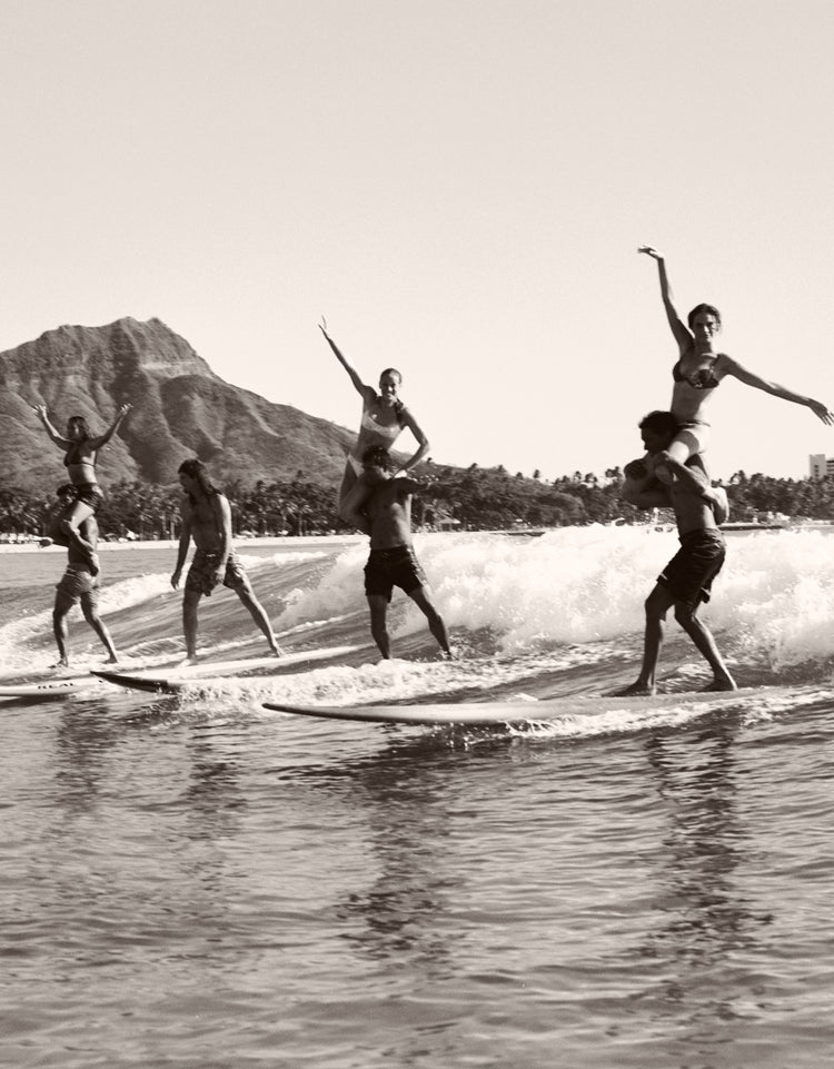 Brian Keaulana and Missy Rayder Tandem Surfing Diamond Head by Anne Menke