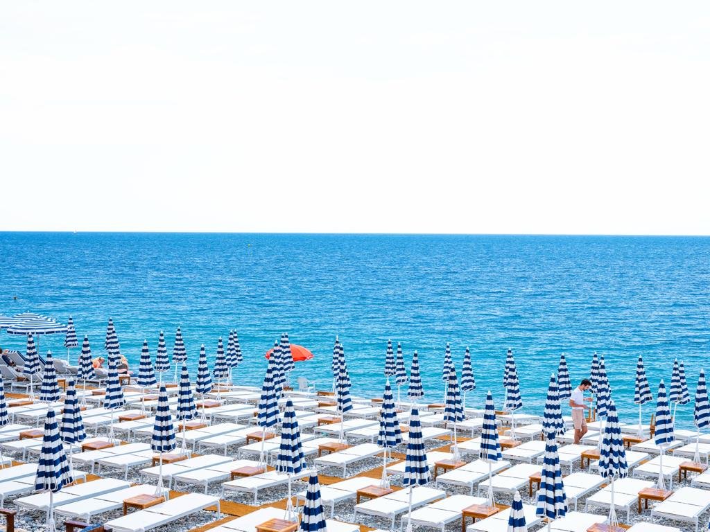 French Riviera -  Nice Rhul Plage Red Umbrella by Juliette Charvet